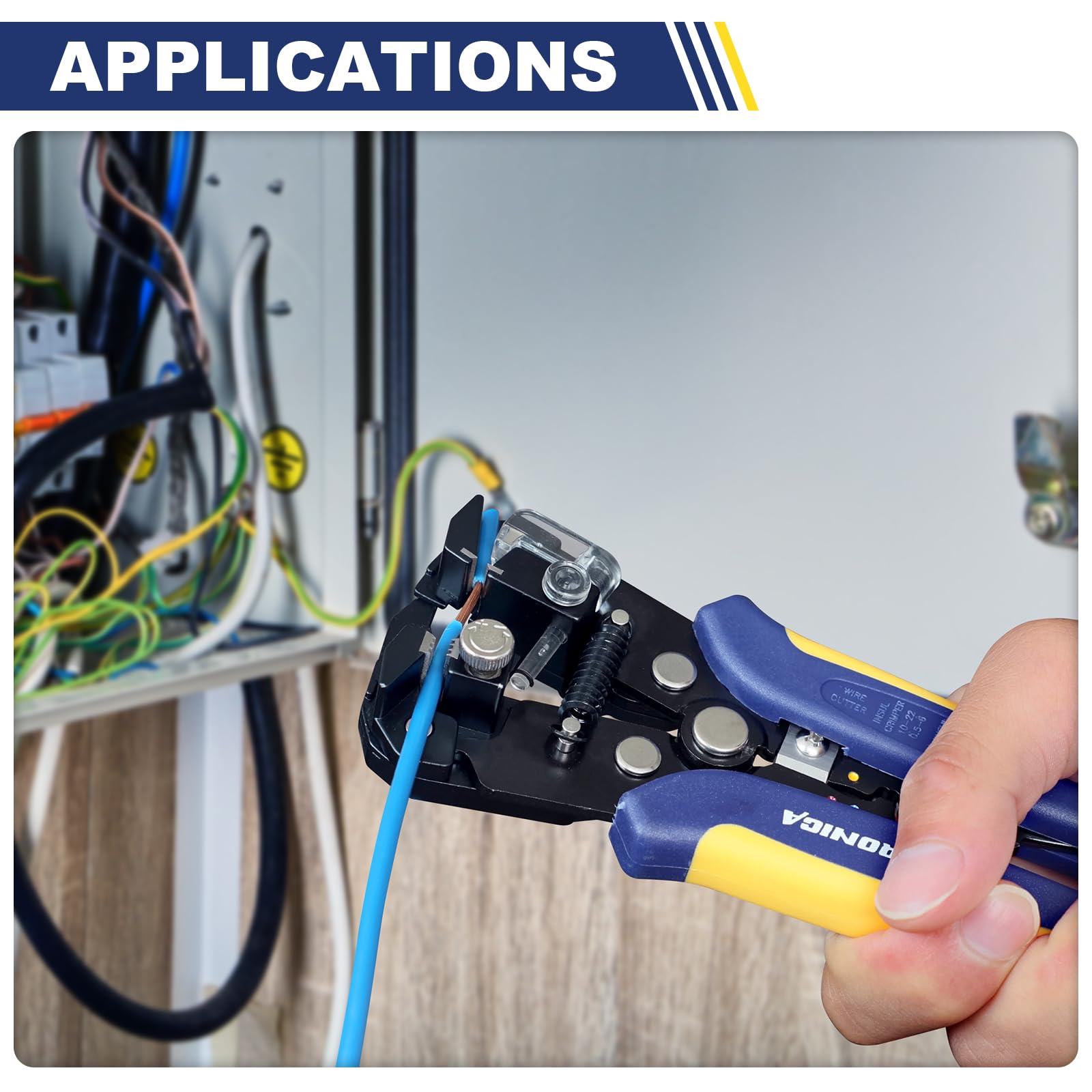 Haisstronica wire stripper in use, blue/yellow handles stripping blue wire, electrical panel background, professional insulation removal.